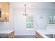 Bright kitchen with white backsplash, stainless appliances and lots of natural light at 247 Brookview Dr, Riverdale, GA 30274