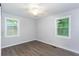 Bedroom with windows offers lots of natural light and a ceiling fan at 2598 Elliott Nw St, Atlanta, GA 30318