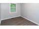 Cozy bedroom with large window and neutral color palette at 2598 Elliott Nw St, Atlanta, GA 30318