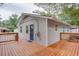 View of the home's rear exterior with a deck and siding at 2598 Elliott Nw St, Atlanta, GA 30318