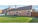 Fenced backyard with a large lawn, ideal for recreation and relaxation at 359 Interlake Pass, Mcdonough, GA 30252