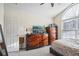 Bedroom showcasing vaulted ceiling, carpet flooring, large window, and dresser at 359 Interlake Pass, Mcdonough, GA 30252