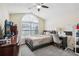 Bedroom featuring vaulted ceiling, carpet flooring, and natural light from window at 359 Interlake Pass, Mcdonough, GA 30252