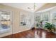 Sun-filled breakfast nook featuring many windows and a view of the backyard at 359 Interlake Pass, Mcdonough, GA 30252