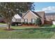 A well-maintained brick home with lush green lawn and tidy landscaping at 359 Interlake Pass, Mcdonough, GA 30252