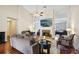 Bright and airy living room featuring vaulted ceilings and cozy fireplace at 359 Interlake Pass, Mcdonough, GA 30252