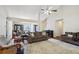 Open-concept living room showcasing hardwood floors and ample seating at 359 Interlake Pass, Mcdonough, GA 30252
