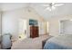 Open main bedroom offers vaulted ceiling, ample space, and lots of storage at 359 Interlake Pass, Mcdonough, GA 30252