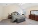 Spacious main bedroom featuring a vaulted ceiling, plush carpet, and ample closet space at 359 Interlake Pass, Mcdonough, GA 30252