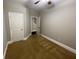Neutral bedroom shows the door to a closet and one to the hallway at 404 Providence Walk St, Canton, GA 30114