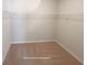 Spacious walk-in closet with ample storage space at 404 Providence Walk St, Canton, GA 30114