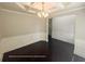 Dining room with decorative chair rail and elegant chandelier lighting at 404 Providence Walk St, Canton, GA 30114