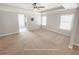 Main bedroom boasts natural light, tray ceilings, and plenty of space at 404 Providence Walk St, Canton, GA 30114