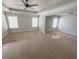A large bedroom showcases natural light, tray ceilings, and neutral colors at 404 Providence Walk St, Canton, GA 30114