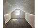 Finished attic space with dormer window, presenting potential for a unique living area at 2319 Browns Mill Se Rd, Atlanta, GA 30315