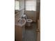 Bathroom featuring tiled walls and floors, and a vanity with sink at 2319 Browns Mill Se Rd, Atlanta, GA 30315