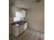 Functional kitchen featuring ample storage and tile flooring at 2319 Browns Mill Se Rd, Atlanta, GA 30315