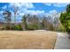 Outdoor amphitheater in a park setting with a stage and lawn seating, ideal for community events and performances at 325 Wynland Trce, Sandy Springs, GA 30350