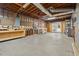 Unfinished basement featuring exposed ductwork, wooden beams, and concrete floors at 325 Wynland Trce, Sandy Springs, GA 30350