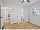 Bedroom with a view into the en suite bathroom and hallway with partial view of the kitchen at 4013 Oglesby Rd, Powder Springs, GA 30127