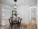 Dining room featuring hardwood floors and a round dining table at 4013 Oglesby Rd, Powder Springs, GA 30127