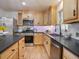 Kitchen showcasing stainless steel appliances, light-colored cabinets, and modern fixtures at 4013 Oglesby Rd, Powder Springs, GA 30127