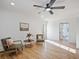 Cozy sitting room featuring hardwood floors, natural light, and minimalist decor at 4013 Oglesby Rd, Powder Springs, GA 30127