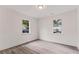 Bright bedroom with hardwood floors and large windows at 819 Humphries St, Atlanta, GA 30310