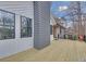 Large wooden back deck area with an exterior view of the surrounding property at 137 Creekview Dr, Woodstock, GA 30188