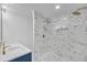 Bathroom featuring a luxurious marble tiled shower at 137 Creekview Dr, Woodstock, GA 30188