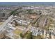 Aerial view capturing a mix of residential and commercial areas with lush tree coverage, showcasing the vibrant urban landscape at 2712 Stargazer Ter, Smyrna, GA 30080