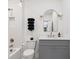 Well-lit bathroom with a modern vanity, mirror, and decorative gold fixtures at 2712 Stargazer Ter, Smyrna, GA 30080