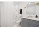 Updated bathroom with a shower/tub combination and a gray vanity with white countertop at 2712 Stargazer Ter, Smyrna, GA 30080