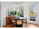 Eat-in kitchen nook featuring a modern light fixture and a beautiful view at 2712 Stargazer Ter, Smyrna, GA 30080