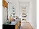 Bright entryway with hardwood floors, decorative console table, and door with glass panels at 2712 Stargazer Ter, Smyrna, GA 30080