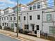 View of modern townhomes with well-maintained landscaping and sidewalks at 2712 Stargazer Ter, Smyrna, GA 30080