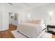 Main bedroom featuring wood floors and stairs to the upper level at 2712 Stargazer Ter, Smyrna, GA 30080