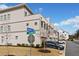 Modern townhomes with a street sign and a parked car at 2712 Stargazer Ter, Smyrna, GA 30080