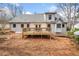 Backyard view of a home featuring a wooden deck perfect for outdoor enjoyment at 4240 Parnell Rd, Marietta, GA 30062