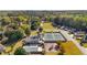 Aerial view of the community, tennis courts, playground, pool, and wooded surroundings at 4350 White Surrey Nw Dr, Kennesaw, GA 30144