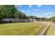 View of the barn on a lush lawn at 4350 White Surrey Nw Dr, Kennesaw, GA 30144