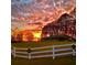 Barn decorated for the holidays and a gorgeous sunset at 4350 White Surrey Nw Dr, Kennesaw, GA 30144