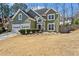 Charming two-story home featuring a well-manicured lawn, two-car garage, and traditional architectural details at 4350 White Surrey Nw Dr, Kennesaw, GA 30144