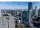 Bustling city featuring several skyscrapers with an appealing blue sky in the background at 3324 Peachtree Ne Rd # 1718, Atlanta, GA 30326