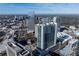 Stunning aerial view showcases a cityscape with modern high-rise buildings against a clear blue sky, perfect for urban living at 3324 Peachtree Ne Rd # 1718, Atlanta, GA 30326