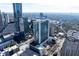 Aerial view of the city showcasing many high-rise apartment buildings and beautiful landscaping at 3324 Peachtree Ne Rd # 1718, Atlanta, GA 30326