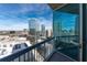 Balcony view showcases the cityscape with blue skies and modern architecture at 3324 Peachtree Ne Rd # 1718, Atlanta, GA 30326