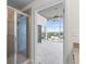 Bathroom featuring a glass shower and bedroom with city views at 3324 Peachtree Ne Rd # 1718, Atlanta, GA 30326