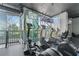 Gym showcasing treadmills with attached screens and floor to ceiling windows with outdoor views at 3324 Peachtree Ne Rd # 1718, Atlanta, GA 30326