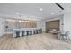 Modern kitchen features a long island with seating and sleek countertops at 3324 Peachtree Ne Rd # 1718, Atlanta, GA 30326